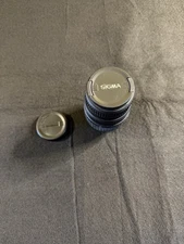 Sigma 70-300mm With 2 Caps 