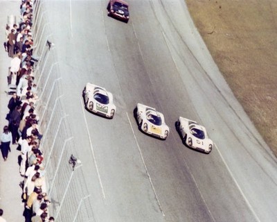 The Porsche 907 factory team groups their cars together a symbolic- Old Photo