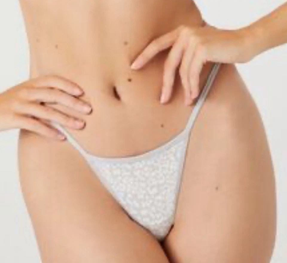 Paquete de 4 bragas de tanga Forever 21 como en la foto vacaciones Navidad talla S Foto 4 de 4