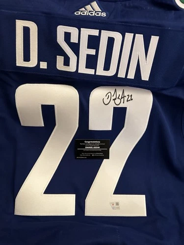 Fanatics Under Wraps Daniel Sedin Blue Canucks Signed Jersey Metal NHL Shield