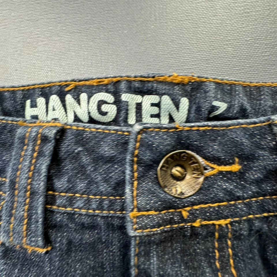 Falda vaquera Hang Ten para niñas talla 7 envejecida con tachuelas dobladillo crudo lavado oscuro Foto 2 de 4