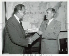 1955 Press Photo Edgar Kaiser delivers a check to Edmund Mansure - afa73679