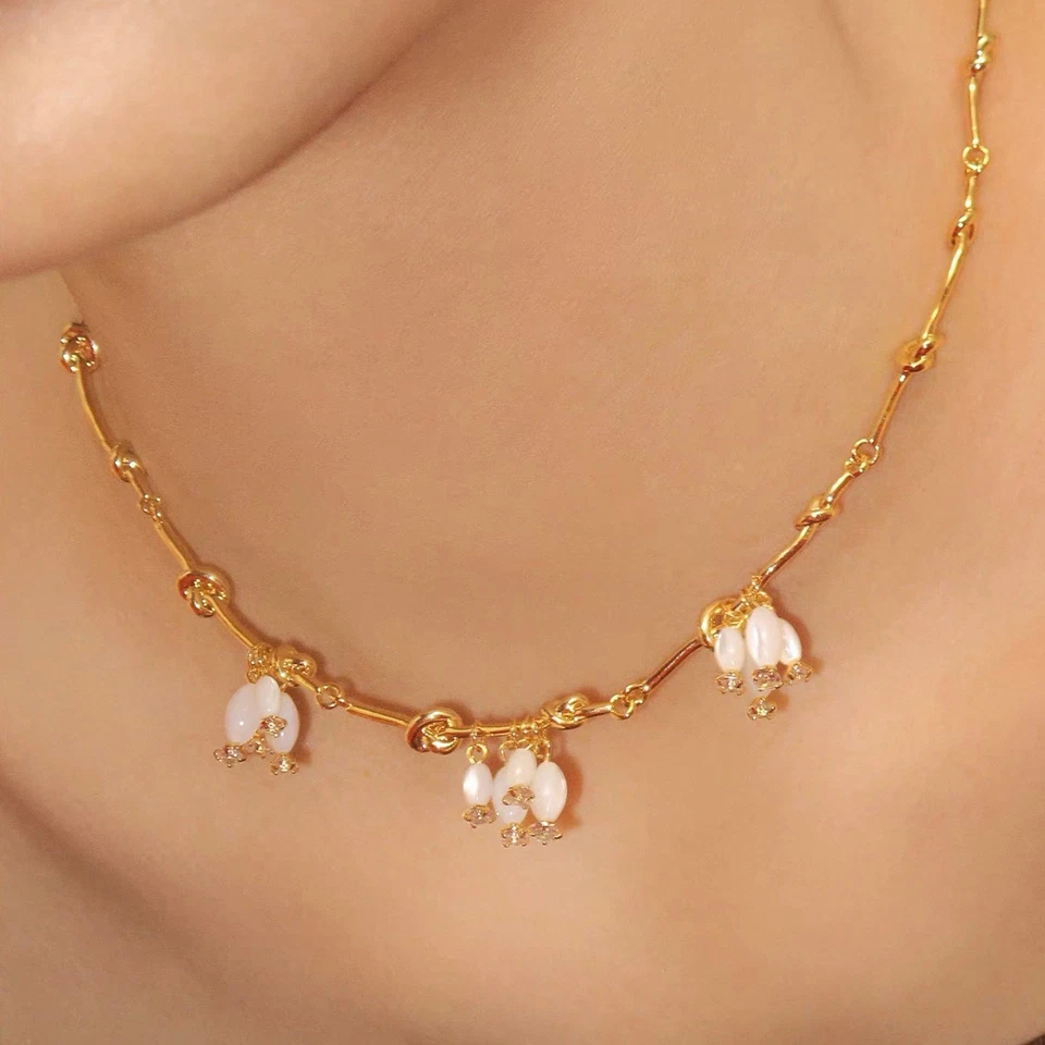 Collar con borla de caracol herradura estilo vintage Foto 2 de 4