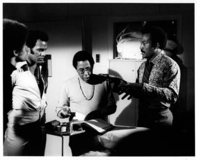 Jim Brown discusses ideas for the upcoming scene with co stars Jim- Old Photo