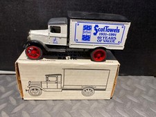 1:34 ERTL VINTAGE BANK 1931 HAWKEYE TRUCK PANEL SCOT TOWELS 60 YEARS OF VALUE