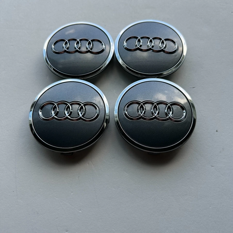 Juego de 4 tapacubos centrales de rueda cromados grises 69 mm para Audi A3 A4 A6 Q3 Q5 TT Foto 2 de 4