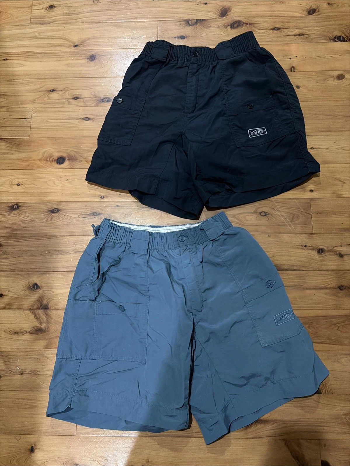 Lot 2 Pair AFTCO Black & Teal Nylon Outdoor Fishing Shorts Mens 32 X 7.5 L
Opens in a new window or