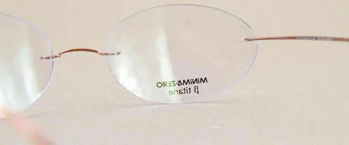 Gafas MiNiMA Zero ovaladas 911 para hombre y mujer sin bordes beta titanio alambre flexible noble - Imagen 11 de 14