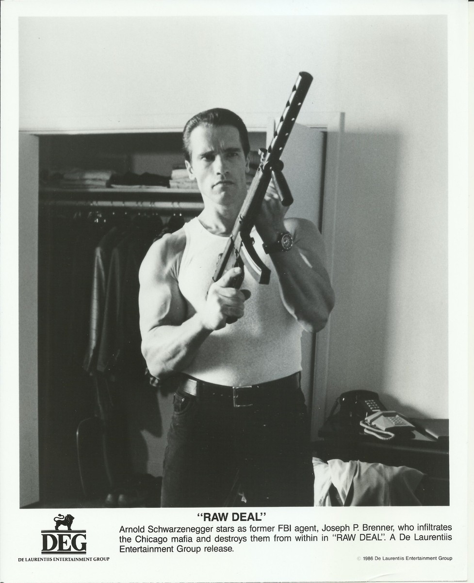 RAW DEAL ARNOLD SCHWARZENEGGER ORIGINAL 1986 DEG 8X10 PRESS