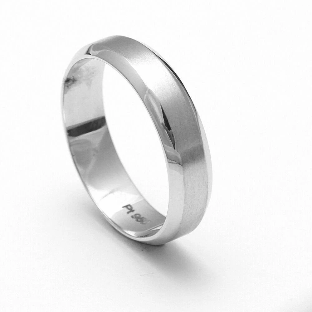 Planning on getting a plain gold wedding band despite my ER being platinum.  This is just a cheapy one from Amazon to help me get a vision. Thoughts on  mixing metals? :