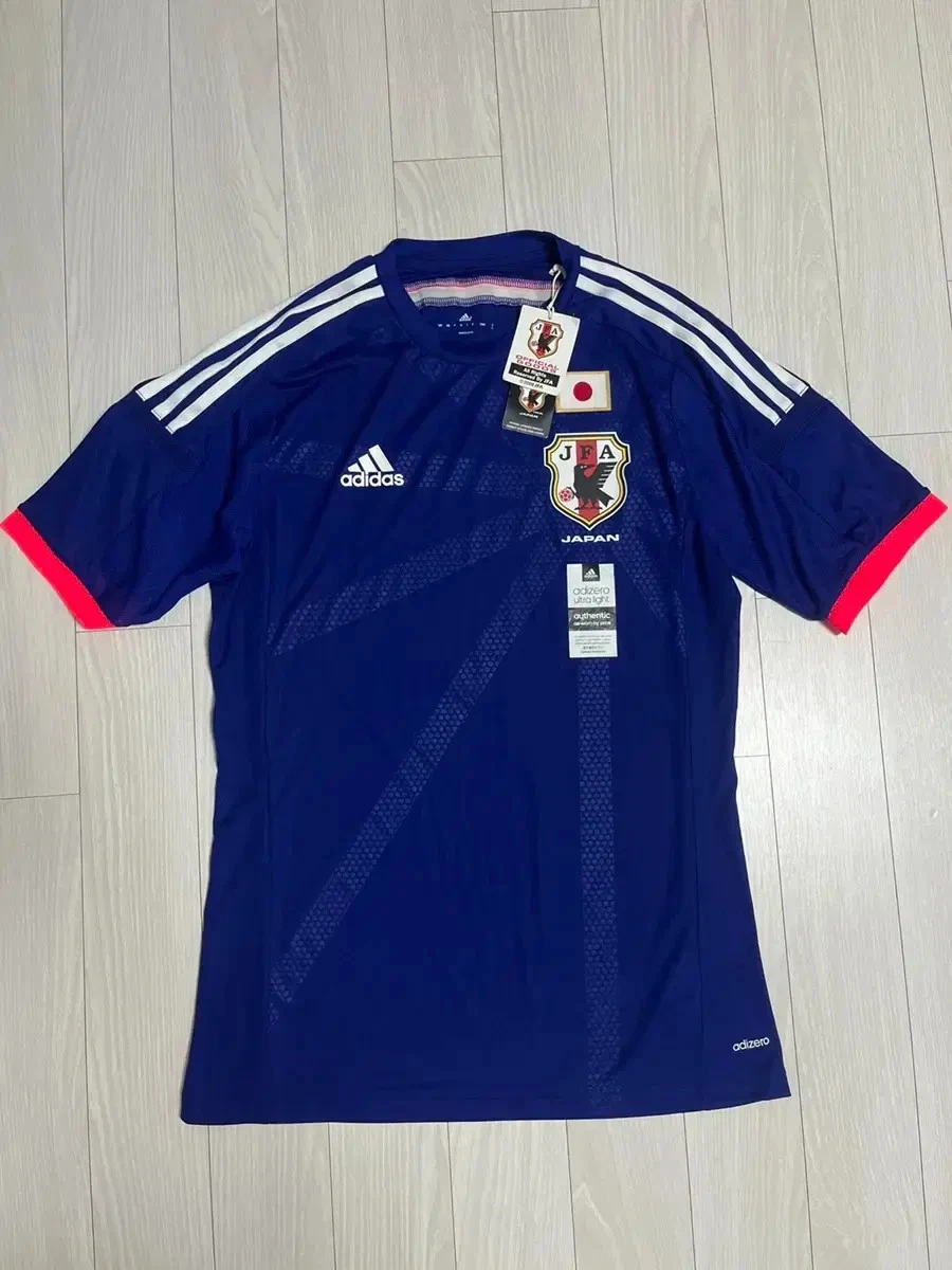 Preços baixos em Japão Azul Equipe Nacional de Roupas e Souvenirs