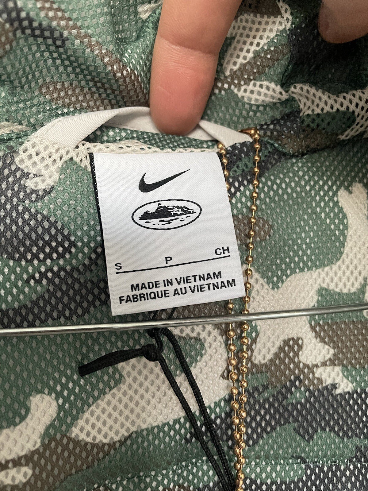 OFF WHITE X NIKE Giacca Nike x Corteiz NRG bianco sporco grigio riflettente