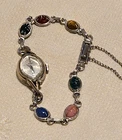 VINTAGE SEIKO DIASHOCK SILVER WITH MULTICOLOR ETCHED STONES BRACELET WATCH
