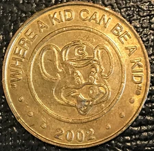 HIGH GRADE AU/UNC 2002 CHUCK E CHEESE WHERE A KID CAN BE A KID TOKEN-MAY203