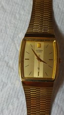 Citizen Quartz Gold Tone Rectangle Dress Watch Gold Dial Metal Bracelet