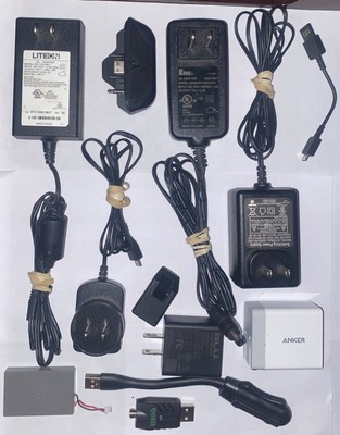 lot of power cords, chargers random miscellaneous electrical