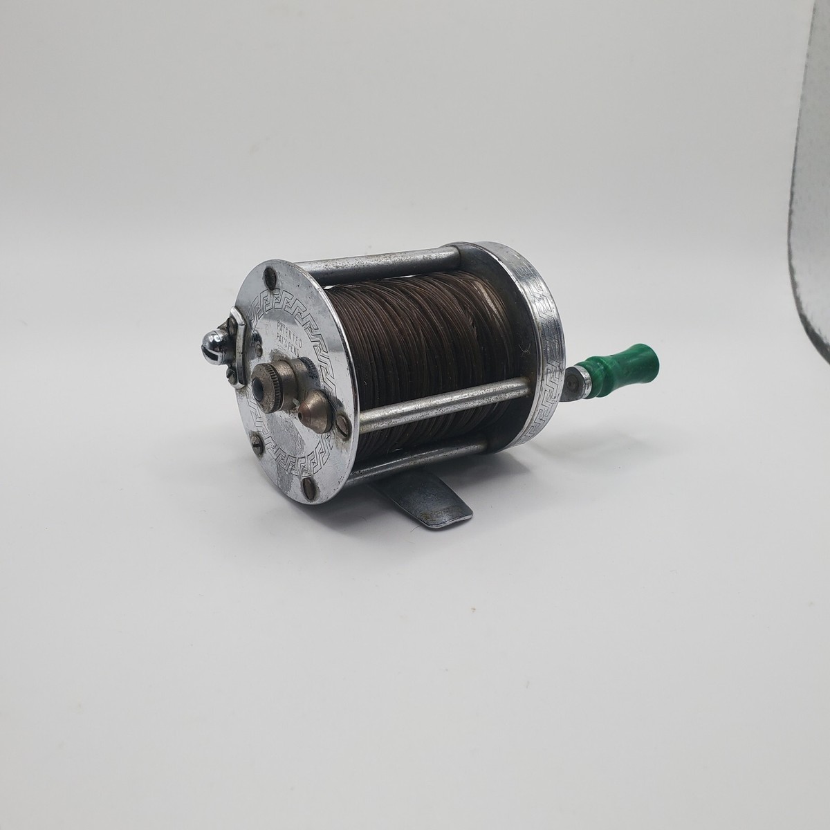 VINTAGE PFLUEGER AKRON NO. 1893 CHROME FISHING REEL GREEN HANDLES
