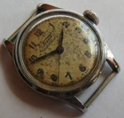 Tissot military type wristwatch steel case screwback load manual