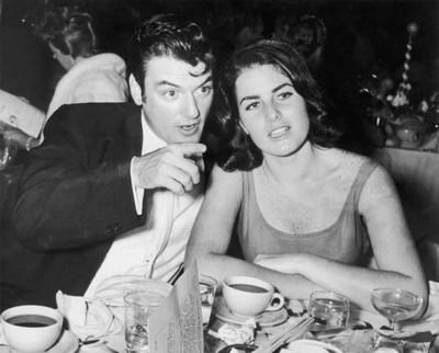 #ad William Campbell sits wife Judith Exner Campbell at a table pointi Old Photo AU $9.00