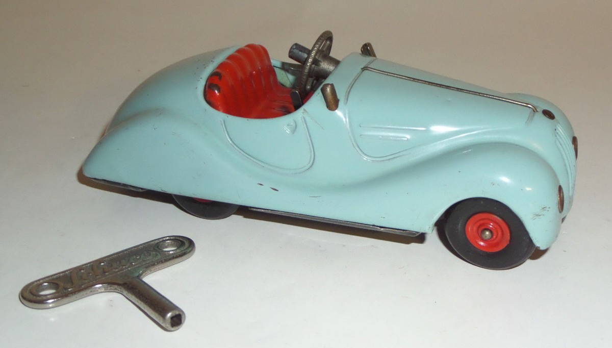 Schuco (ドイツ Akustico 2002 ORIGINAL VINTAGE 1940's SCHUCO AKUSTICO 2002 TIN WIND-UP KEY SKY