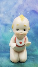 KE1 Vintage Lefton Porcelain Bisque Kewpie Wearing Heart Bib Kneeling 1985