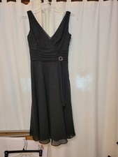 London times black dress, size 4, sparkly with brooch accent