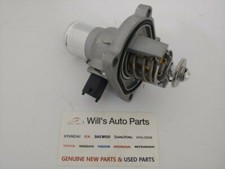 GENUINE BRAND NEW THERMOSTAT & HOUSING SUITS HOLDEN TJ TRAX 1.8L 2011-2016