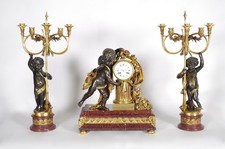 Alfred Beurdeley, Louis XVI gilt bronze mantelpiece set, 19th century