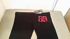 new womens hustler drawstring yoga pants black with red metallic letters