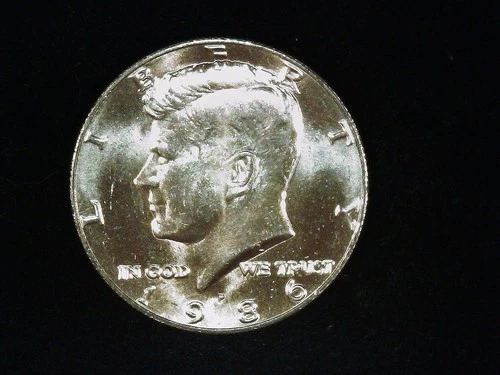 1986-P Kennedy Half Dollar AU++ (1). Free Shipping!