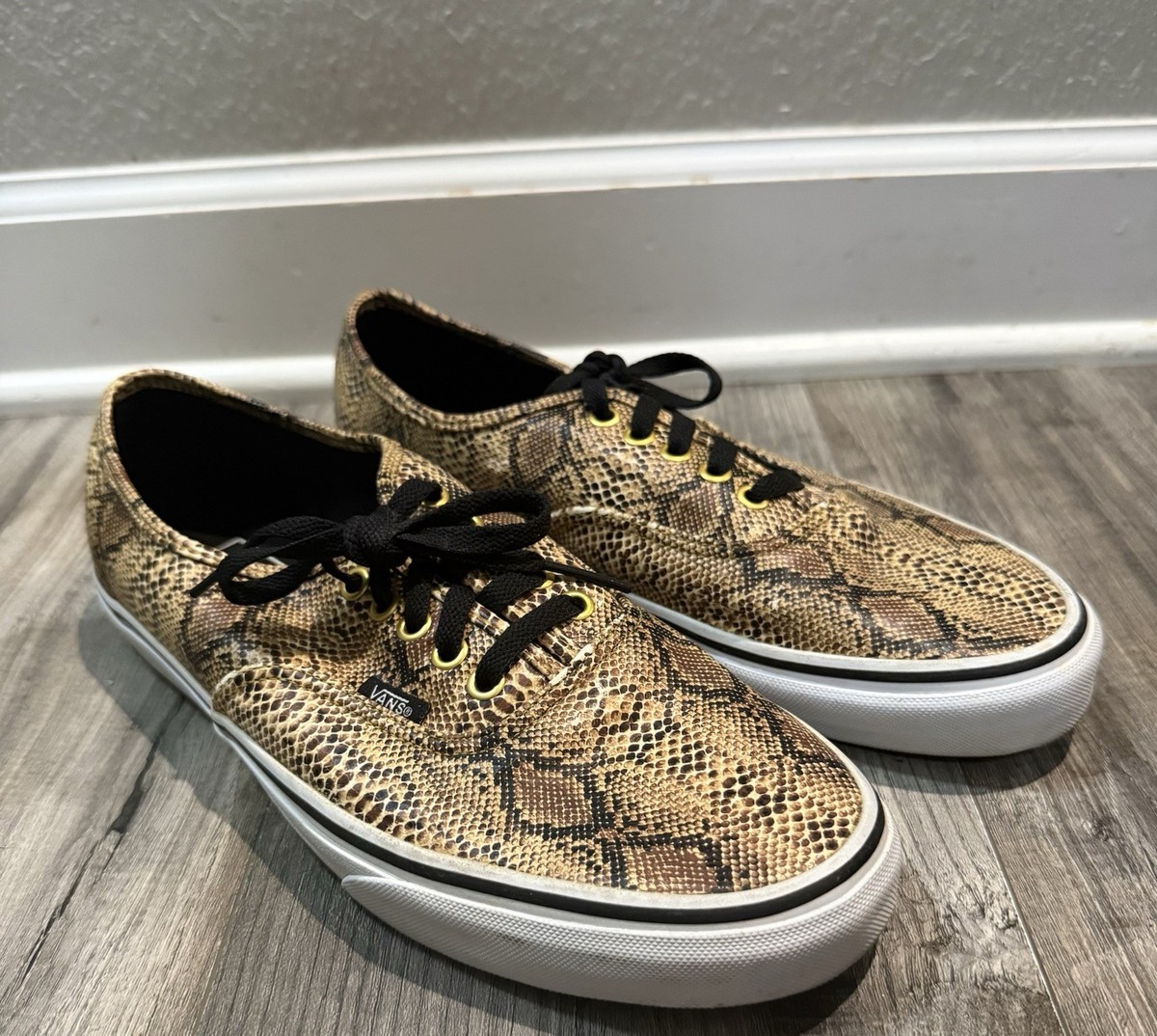Vans Authentic low-top sneakers in a brown/gold snakeskin print