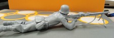 A lying German soldier with a machine gun 3D print in scales