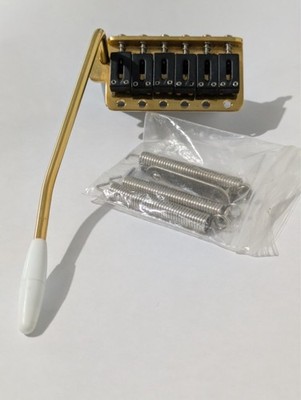 Strat Tremolo bridge with Graph Tech saddles, Gold and Black
