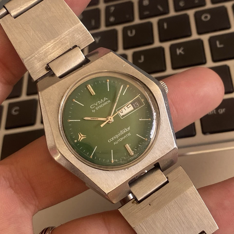 RELOJ TV ORIGINAL CYMA By SYNCHRON CONQUISTADOR AUTOMÁTICO PLATEADO HOMBRE VINTAGE AÑOS 70 Foto 2 de 4