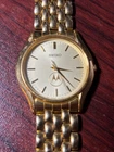 Vintage Seiko Mens Watch 34mm Gold Tone Stretch Band V701-7A29 Motorola Logo