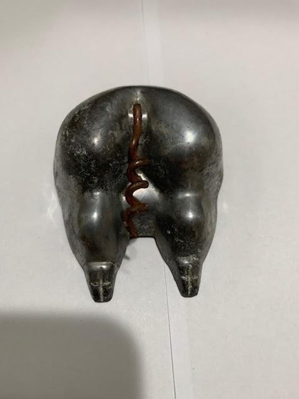 Vintage corkscrew in a shape of pigs butt