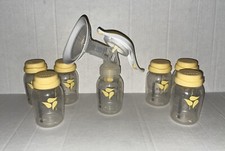 MEDELA MANUAL PUMP 7 BREASTMILK STORAGE BOTTLES