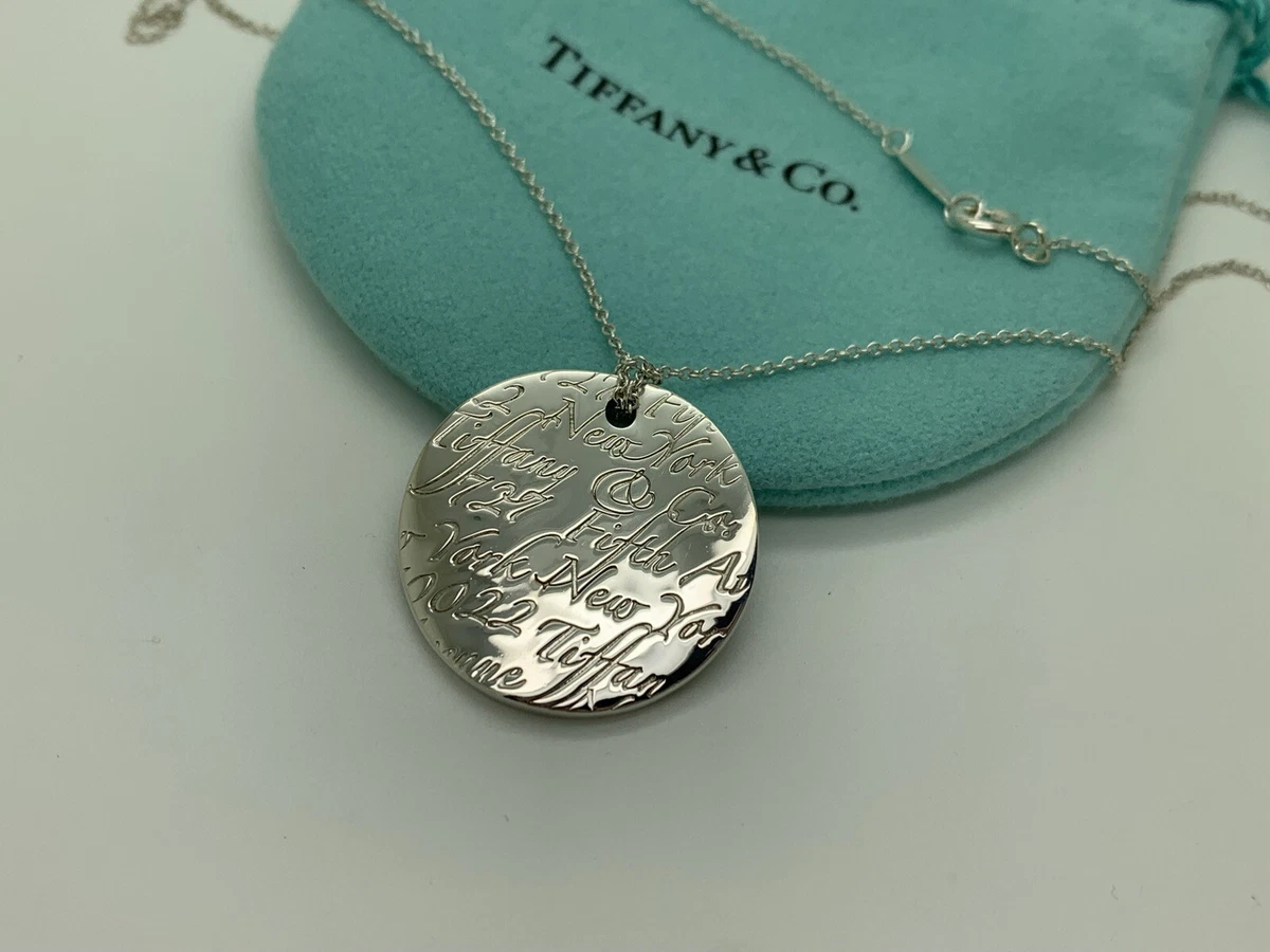 Tiffany Notes alphabet disc charm in silver on a chain. Letters A-Z  available. | Tiffany & Co.