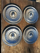 4 Used 14 Inch Hubcaps For 1957 Ford