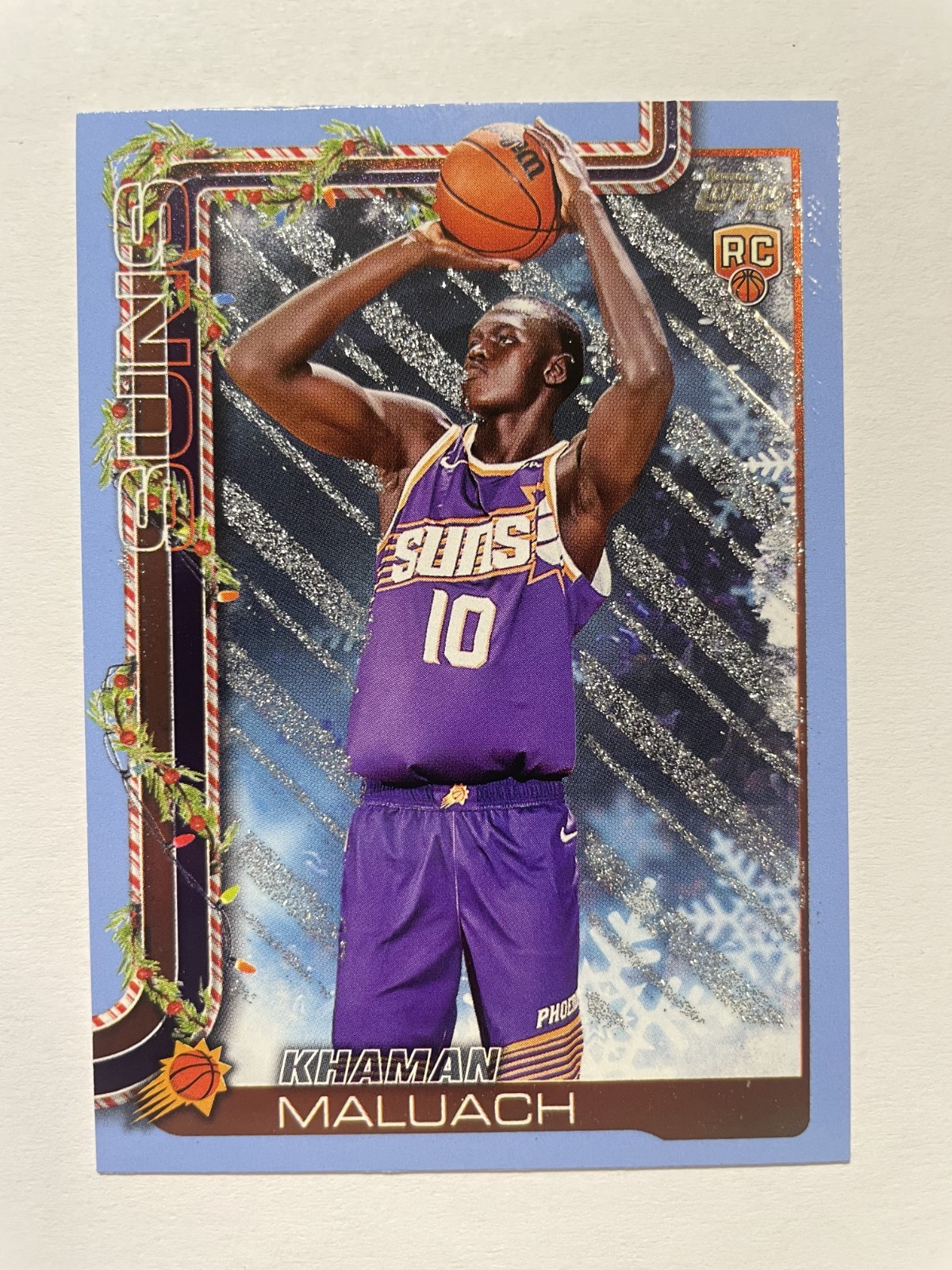 Khaman Maluach #H170 | 2025-26 Topps Holiday [Metallic Blue Glitter [RC] [Suns]