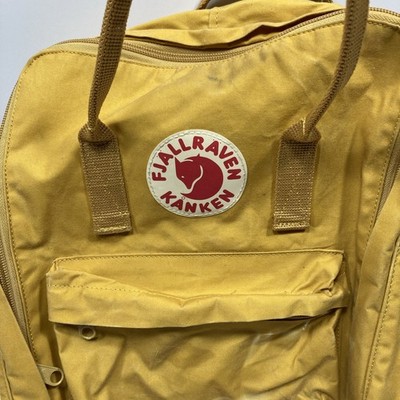 yellow backpack fjällräven Kånken Mini where it prevents the contents of the backpack from pressing against your back—and is always within reach when you want to take a break and sit down wherever you are Fjällräven Abisko Softpack 16 Backpack