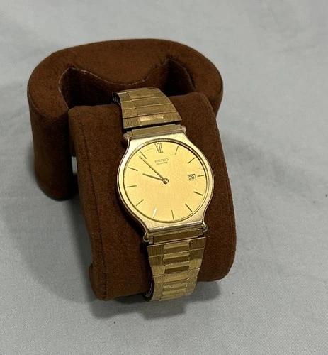 Vintage Seiko 5Y39-8A09 Quartz Gold Tone Watch 32mm Date Gold Dial Stretch Band