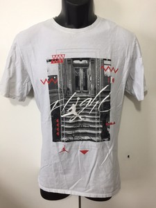 white nike graphic tee