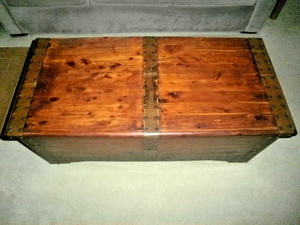 old antique vintage wood trunk with trim and hinges (metal). good condition