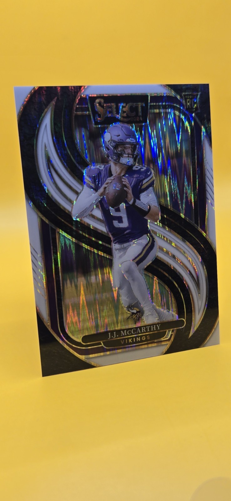 2024 Panini Select JJ McCarthy Premier Level white Prizm Shock 60/199 #134 SP RC