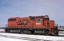 RR Print-DETROIT TOLEDO & IRONTON DT&I 6351 GP35 at Moline Oh  3/8/1986