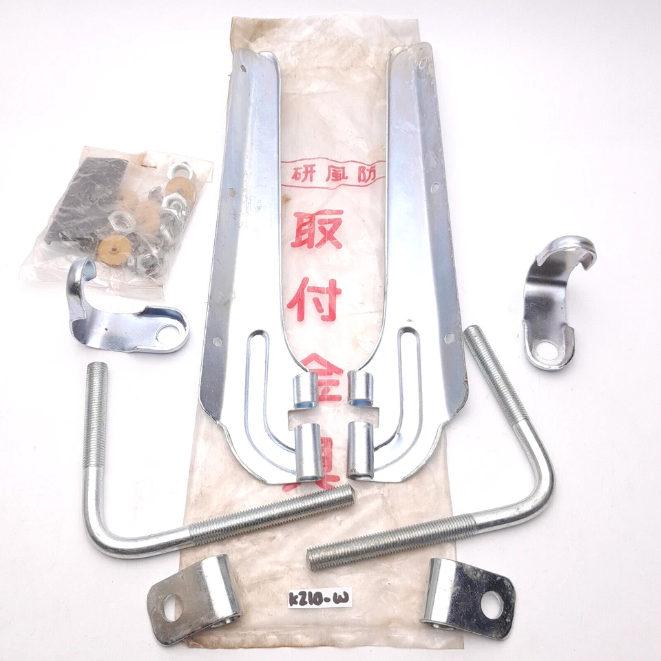 Soporte parabrisas Honda Pasport C50 C70 C90 NOS Foto 2 de 4