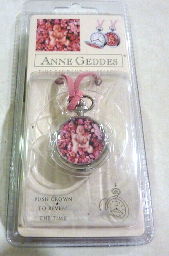 Anne Geddes 2002 Baby in Bed of Flowers Pendant Watch Necklace.