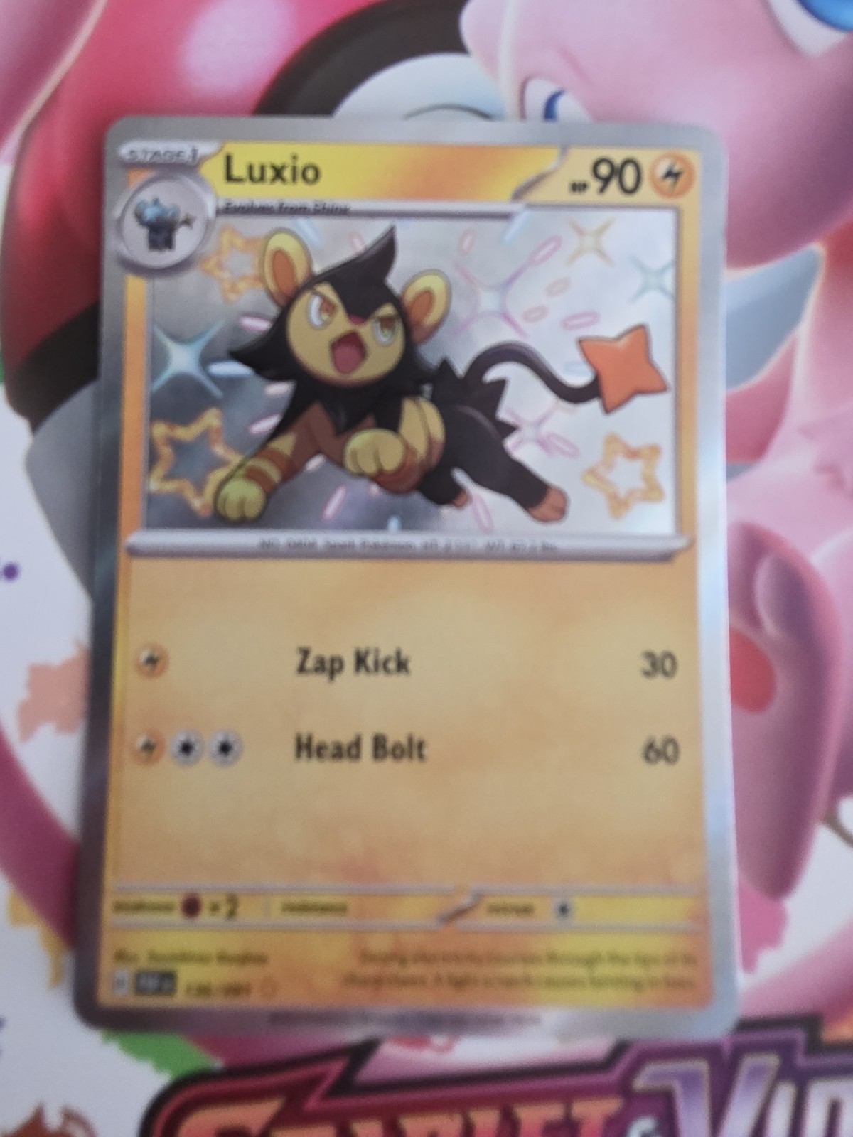 Luxio 136/091 SV: Paldean Fates Holo