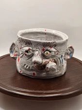 Ugly Face Pottery Planter.  Marked Don't  even think about putting coffee in me.